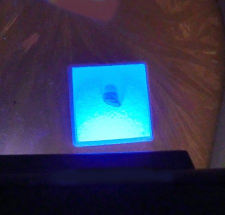 _Taaffeit bzw. Magnesiotaaffeit_Rohstein_Leuchtlupe_UV LW+KW blau_3,4 ct_10 x 6 x 6 mm_Ohngaing_Mogok_Myanmar_Peter_1a.JPG